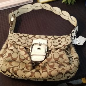 Coach handbag. Dark and light brown signature C